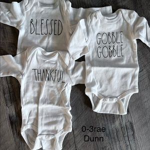 Lot of three Rae Dunn baby Thanksgiving onesies